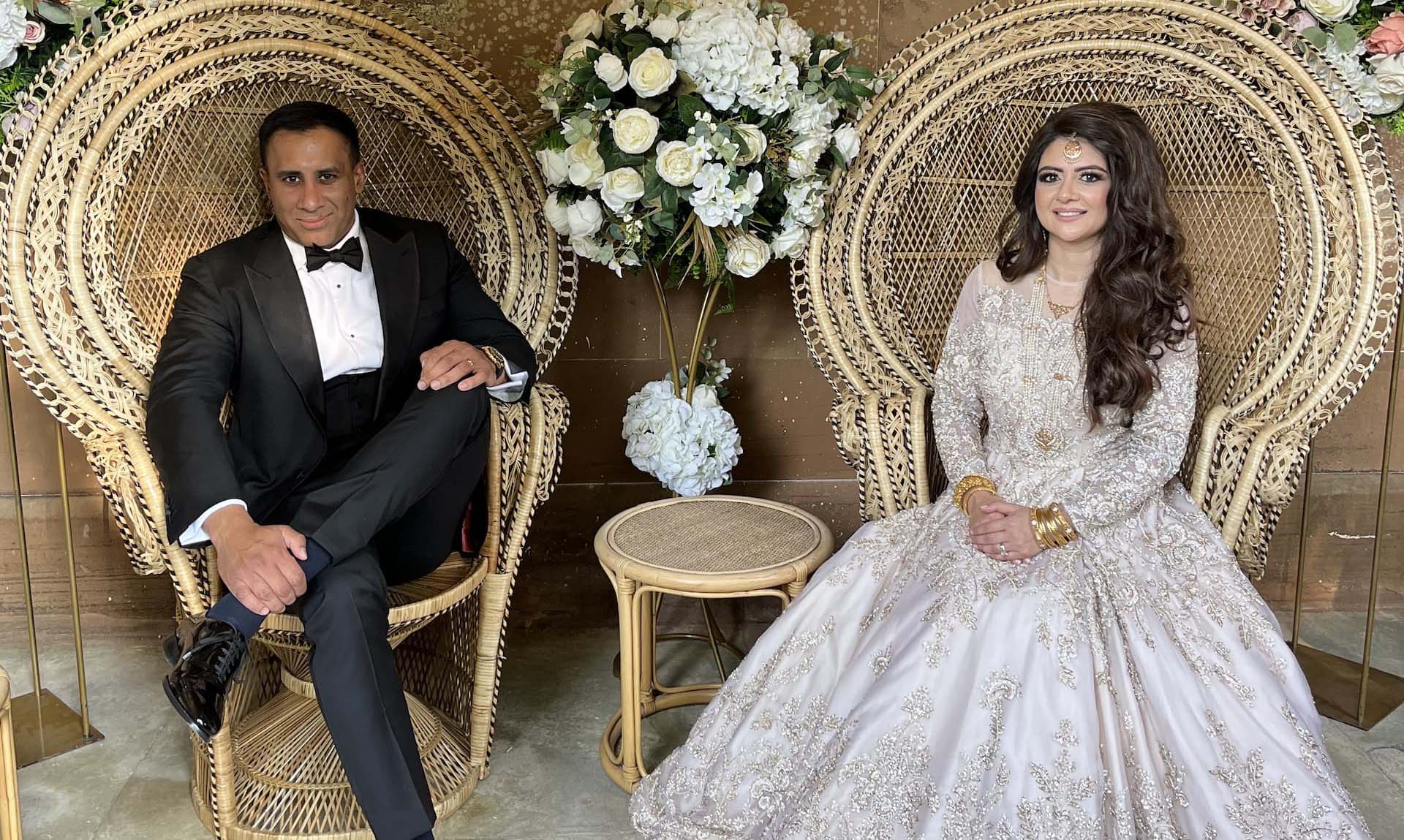 bride and groom sitting after their wedding